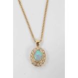 18ct gold opal and diamond pendant on chain