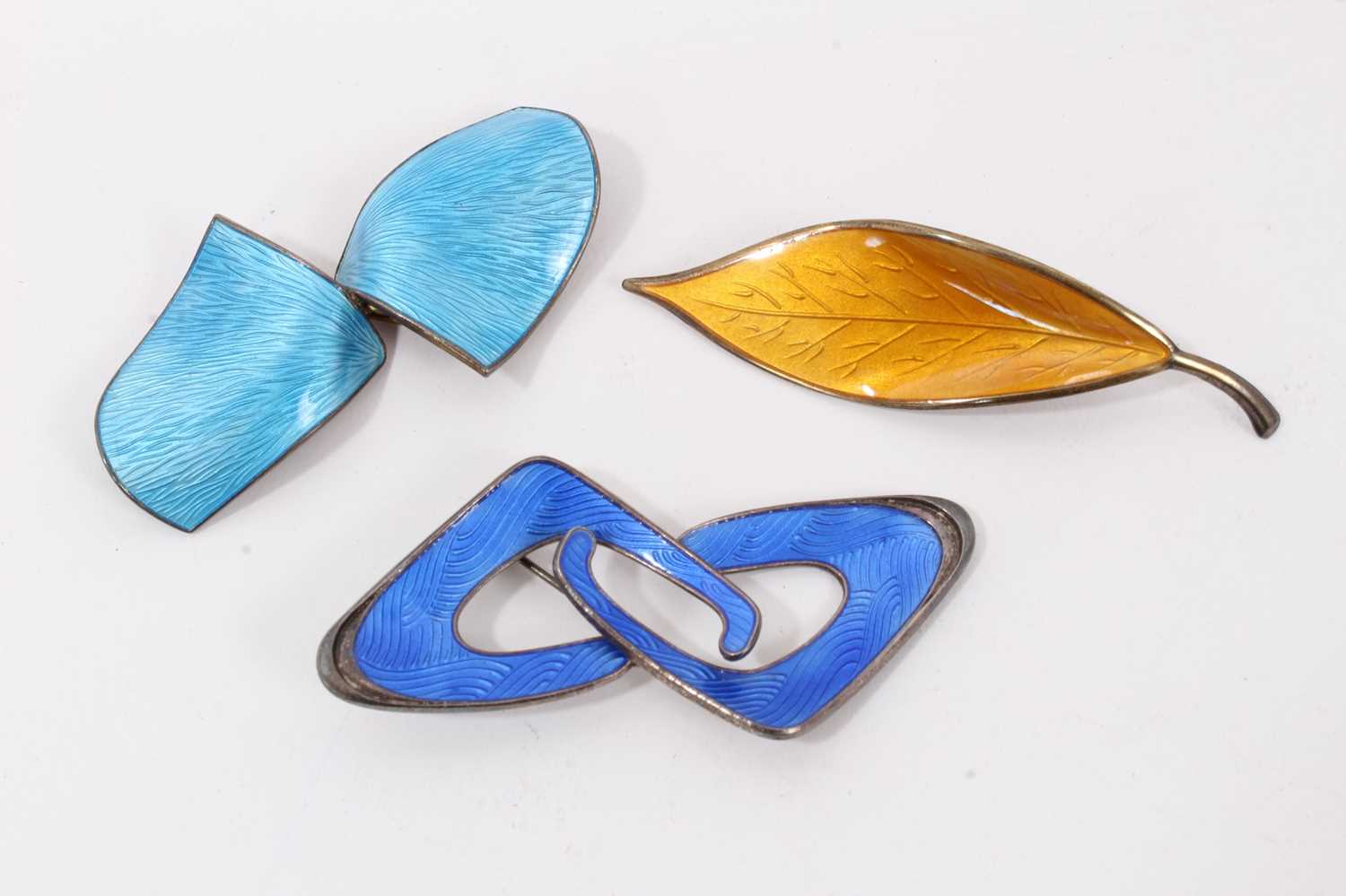 Three Norwegian silver and enamel brooches
