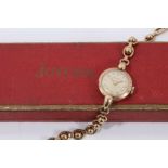 Vintage ladies Juvenia 9ct gold cased wristwatch on 9ct gold bracelet, boxed
