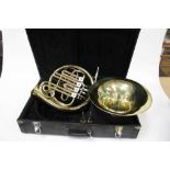 Brass French horn with detachable bell and two mouthpieces, cased