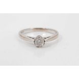 Diamond single stone ring with a round brilliant cut diamond, weighing approximately 0.25cts, in six