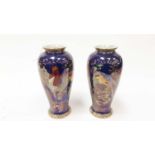 Pair of Carlton Ware lustre vases decorated with parrots on a blue lustre ground