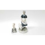 Two Royal Copenhagen porcelain models - Fawn riding tortoise number 858 and Lady with goose number 5