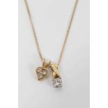 18ct gold diamond single stone pendant and one other pendant on chain