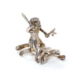 Ealrly 20th century silver novelty miniature toy ornament of a figure on a Komodo dragon,