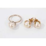 Cultured pearl ring in four claw setting and pair matching earrings