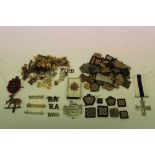 Large collection of British and other military cap badges (1 box)