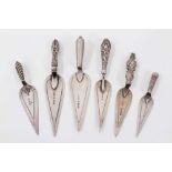 Six silver trowel bookmarks all with silver handles
