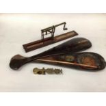 A brass set of sovereign scales by Harrison, a further fold out set of sovereign scales, and a set o