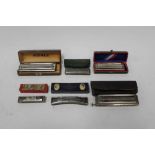 Six vintage harmonicas in original boxes