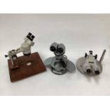 Three modern binocular microscopes
