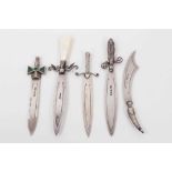 Five silver bookmarks all in the from of swords/knives including one mounted with malachite and one