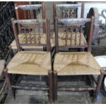 Set of four unusual 19th century wicker country chairs, each painted with landscape scene to the top