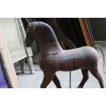 19th century child's polychrome painted toy horse, on sledge base and castors, 55cm long