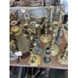 Collection of brass candlesticks, pestles and mortars and other brassware