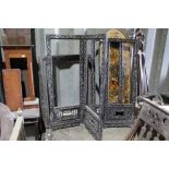Late 19th century Chinese carved hardwood four fold screen frame with pierced floral scroll decorati