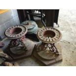 Two Victorian cast iron lantern bases and two marble plinths