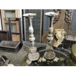 Pair Antique painted pine pricket alter candlesticks on scroll feet with associated metal drip pans