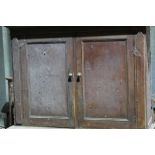 Victorian grained pine cupboard on chest with two panelled doors enclosing shelves, six short drawer