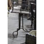 Late 19th / early 20th century floorstanding mahogany and brass canterbury, within open brass divisi