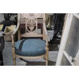 French Empire style painted beech open armchair, with pierced fan back and stuffover seat on turned