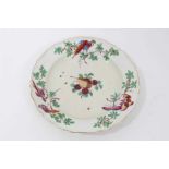 A Worcester plate, painted in the London atelier of James Giles with birds and fruits, circa 1770