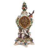 Large 19th century Meissen porcelain clock with floral encrusted decoration and dancing figures, 67c