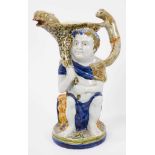 Prattware 'Bacchus & Pan' jug, circa 1800, Bacchus shown seated on a barrel, with dolphin form spout