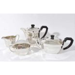 Contemporary silver, composite three piece tea set, comprising teapot, hot water jug and milk jug