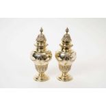 Late Victorian pair of silver gilt castors and covers, London 1897/98