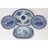 Five 18th century Chinese blue and white export dishes, one decorated in the Fitzhugh style and the