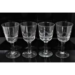 Set of ten good quality wine glasses with engraved sporting decoration