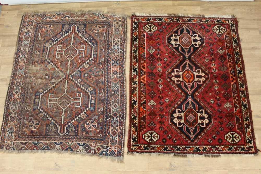 Small Persian rug, together with another