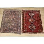 Small Persian rug, together with another
