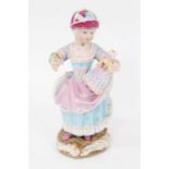 Meissen figure of a girl with a doll