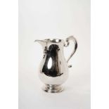 Georgian style silver water jug of baluster form, by C. J. Vander Ltd, London 1962, 24oz