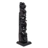 Unusual Haida type carved black stone totem in the manner of Charles Edenshaw