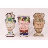 Three large early 19th century Staffordshire pottery Satyr-mask jugs, 18.5cm to 22cm high