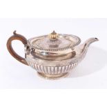 George IV silver teapot of squat melon form (London 1821), all at approximately 26ozs