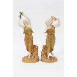 Pair of Royal Worcester blush ivory figures of musicians