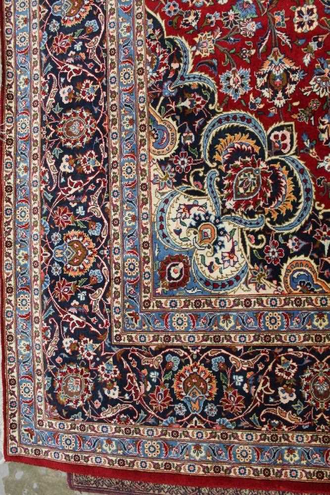 Large Kashan carpet, with meander foliate ornament on midnight blue ground in foliate meander border - Image 3 of 6