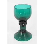 A George III green tinted wine glass, in German style