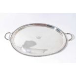 Georgian style twin handled oval tray, with engraved armorial, CJV, London 1959, approximately 68oz