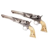 A very fine cased pair of silver plated Gustave Young deluxe engraved .36 Cal. Colt Model 1862 Polic