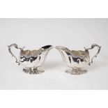 Pair of late Victorian silver shell shape sauce boats London 1896, together with one other