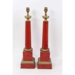 Pair of Classical style gilt metal mounted red painted toleware column table lamps