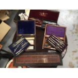 Three 19th century mathematical instrument sets and inlaid cribbage board