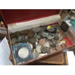 Collection of assorted coins to include two replica U.S. Dollar coins.