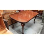 Early 20th century mahogany extending dining table with one extra leaf on cabriole legs, 147cm x 106