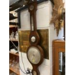 Two 19th century mahogany banjo barometers together with a sunburst clock. (3)